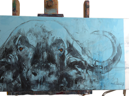 Artistic depiction of a buffalo on an easel with a neutral background