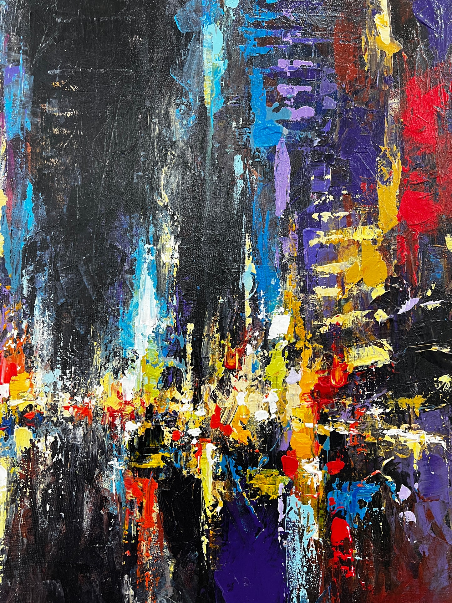 Abstract painting with a variety of colors on a dark background