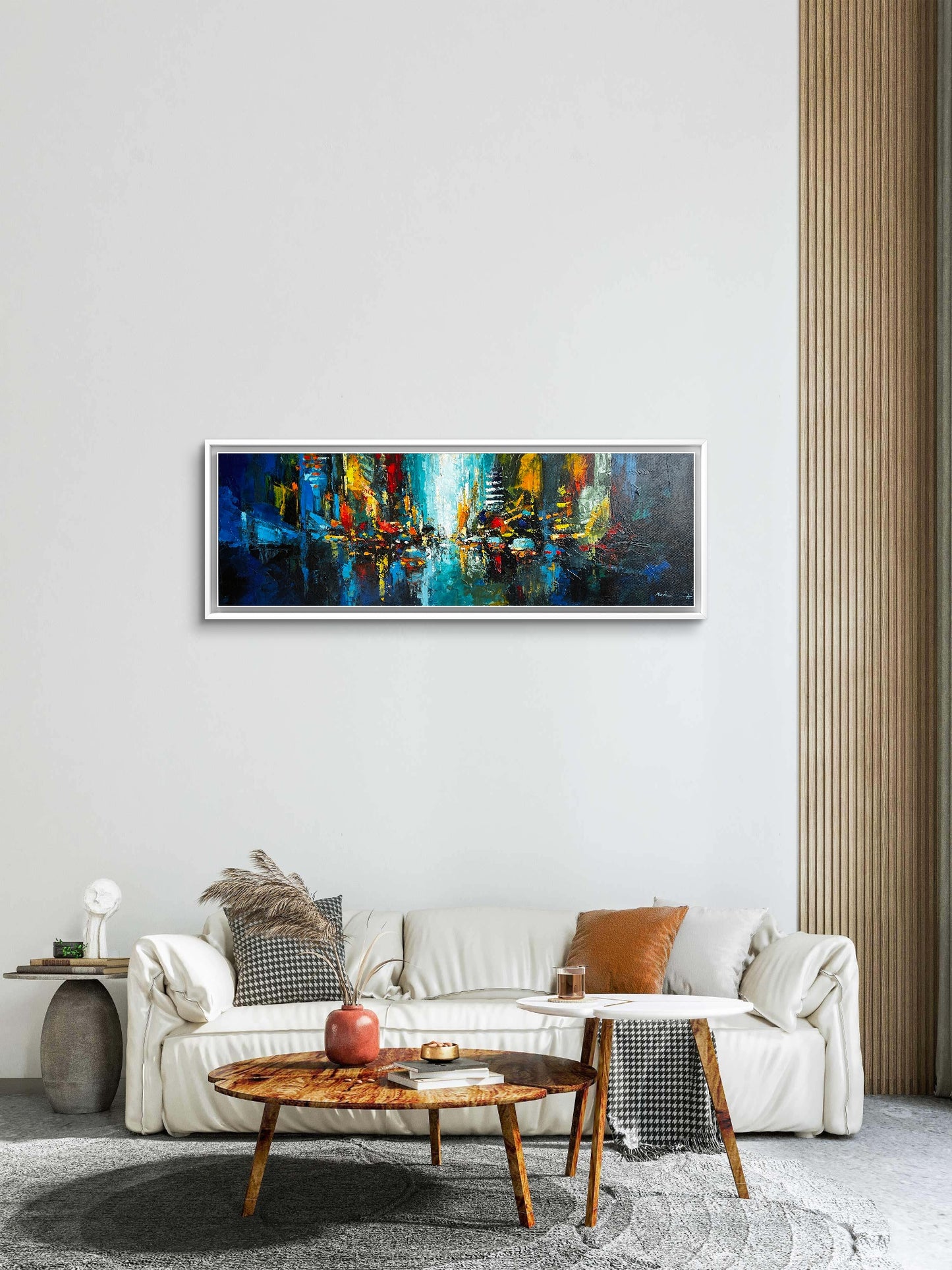 Living room with a colorful abstract cityscape painting 