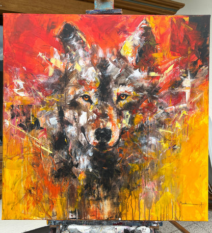 Abstract painting on an easel with a palette and brush in the background