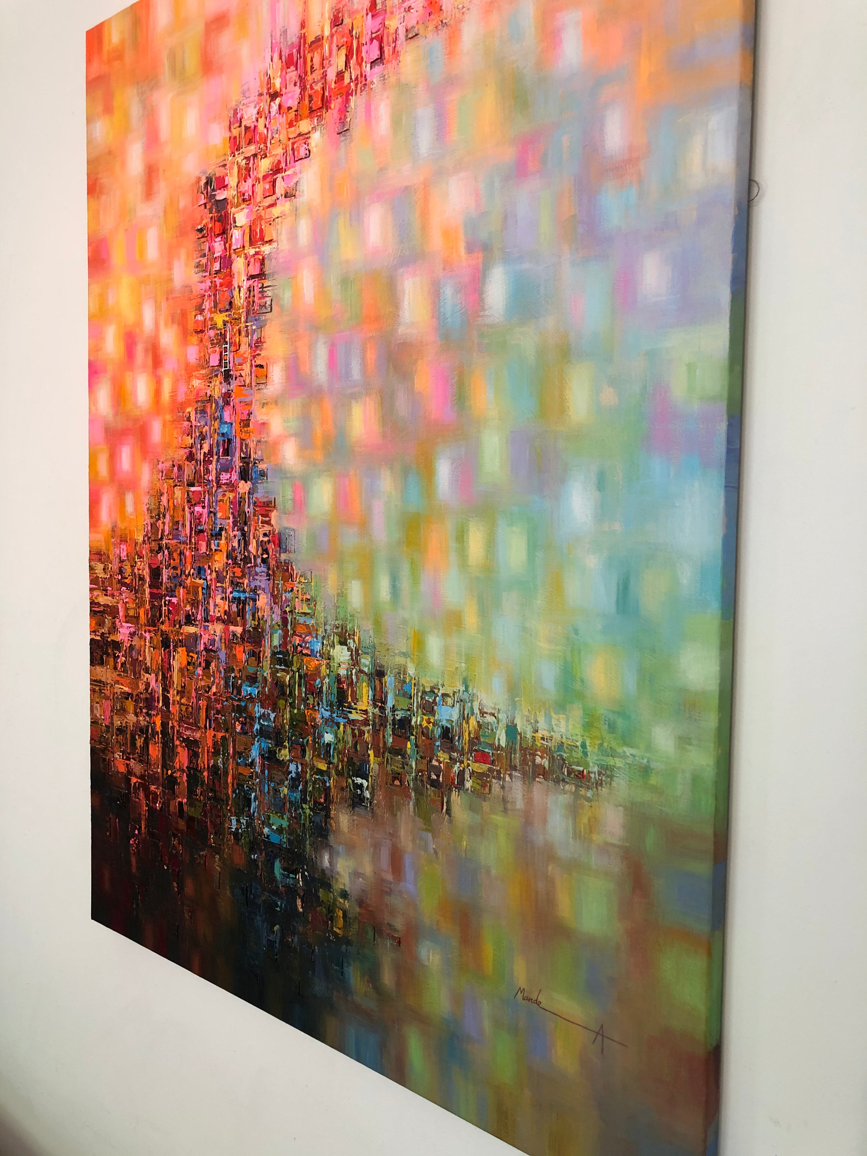 A vertical abstract canvas painting hanging on a white wall, featuring a dense, textured mosaic of orange, red, pink, blue, green, and yellow tones with a darker, painterly lower section.